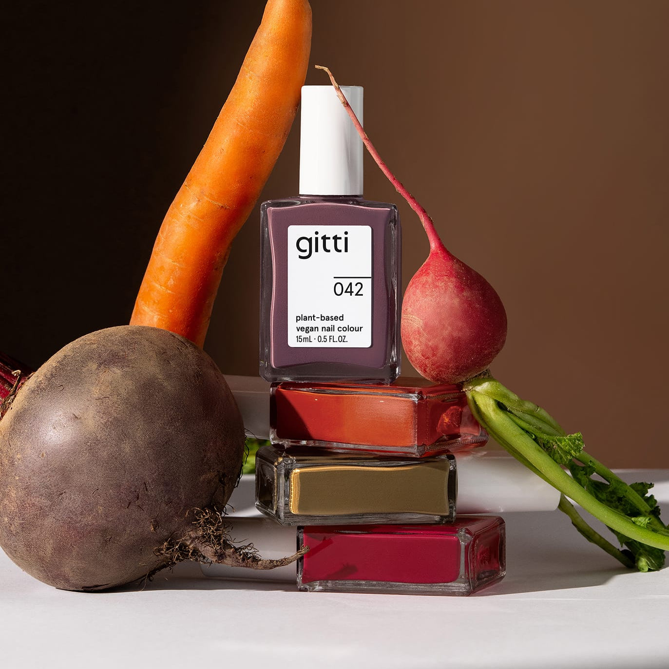 Grounded Collection Fall Shades in front of fall vegetables in matching colors