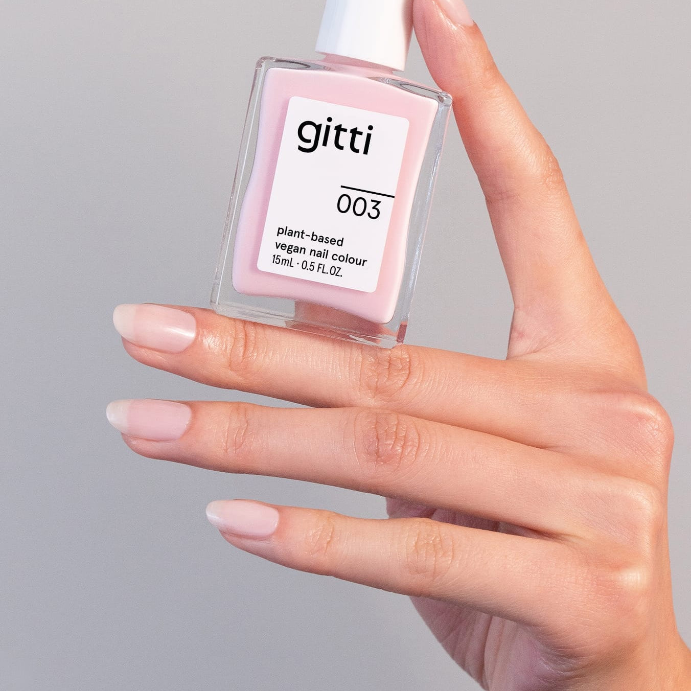 Manicured Nail showing gitti no. 003, a soft sheer pink