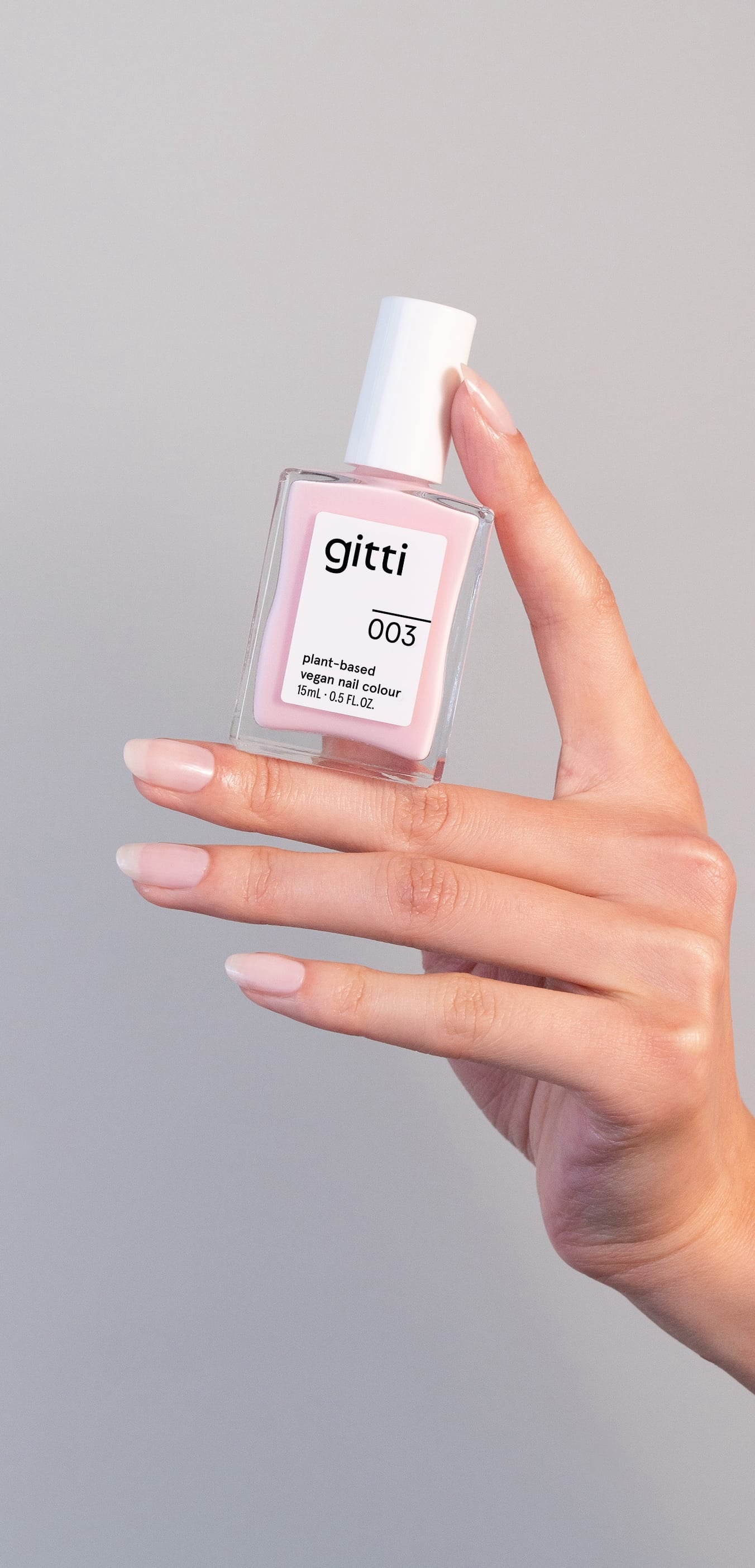 Manicured Nail showing gitti no. 003, a soft sheer pink