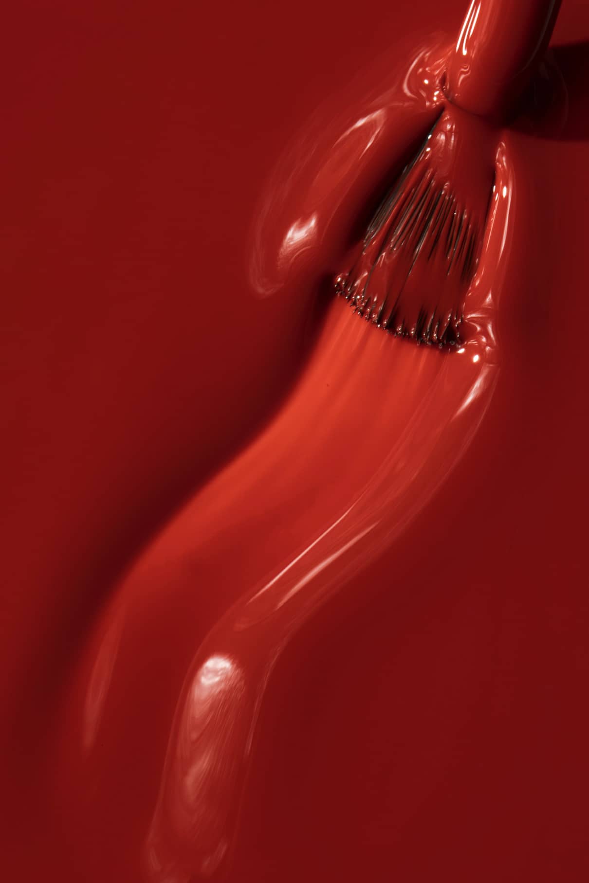 Close-up of a red nail polish texture